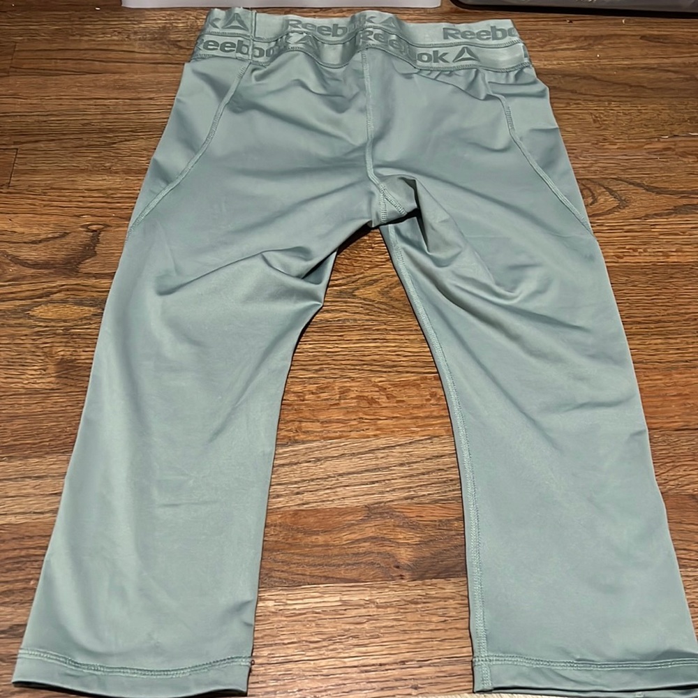 Reebok women’s Teal workout leggings
